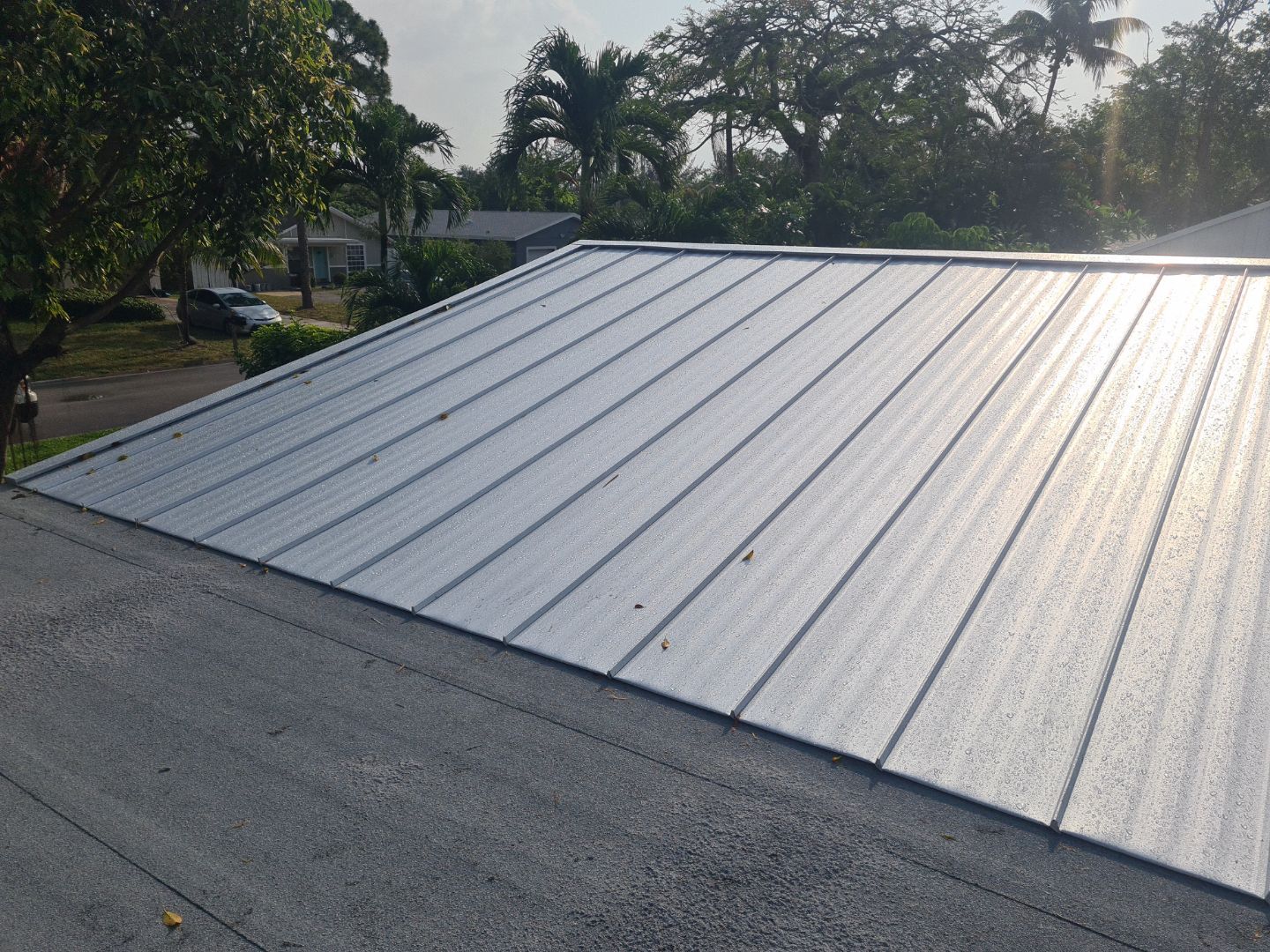Residential Roofing Installation using 1" Nail strip metal roof by BLUES BROTHERS ROOFING