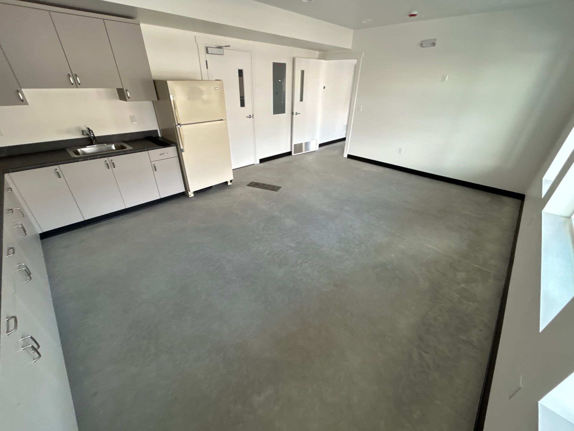 Colfax Commercial Shop Transformation With Vapor Mitigating Floor Coatings by Croc Coatings, LLC