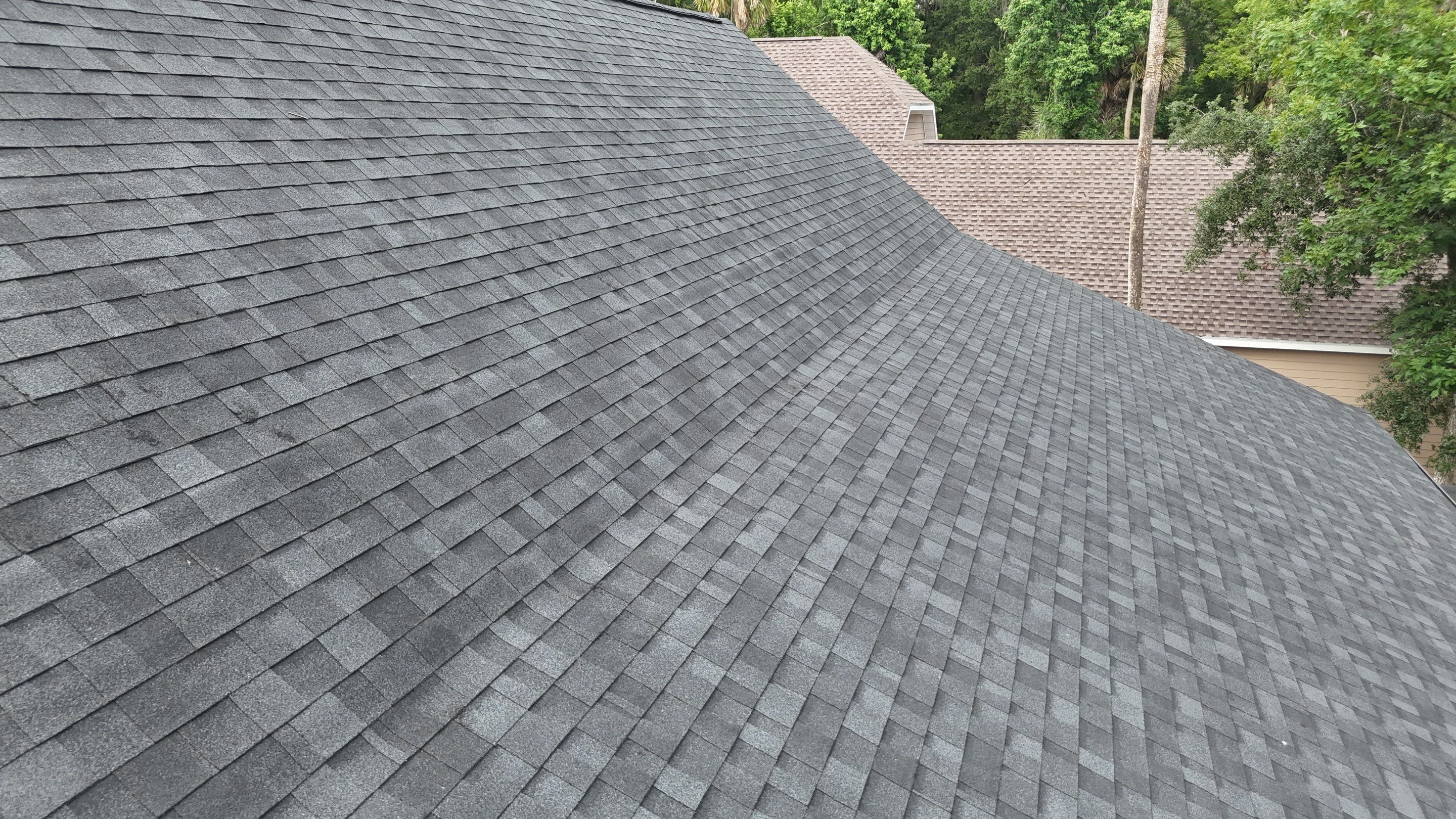 Comprehensive Onyx Black Asphalt Shingle Roof Replacement for Flagler Beach Residence by Trinity Restoration and Roofing LLC