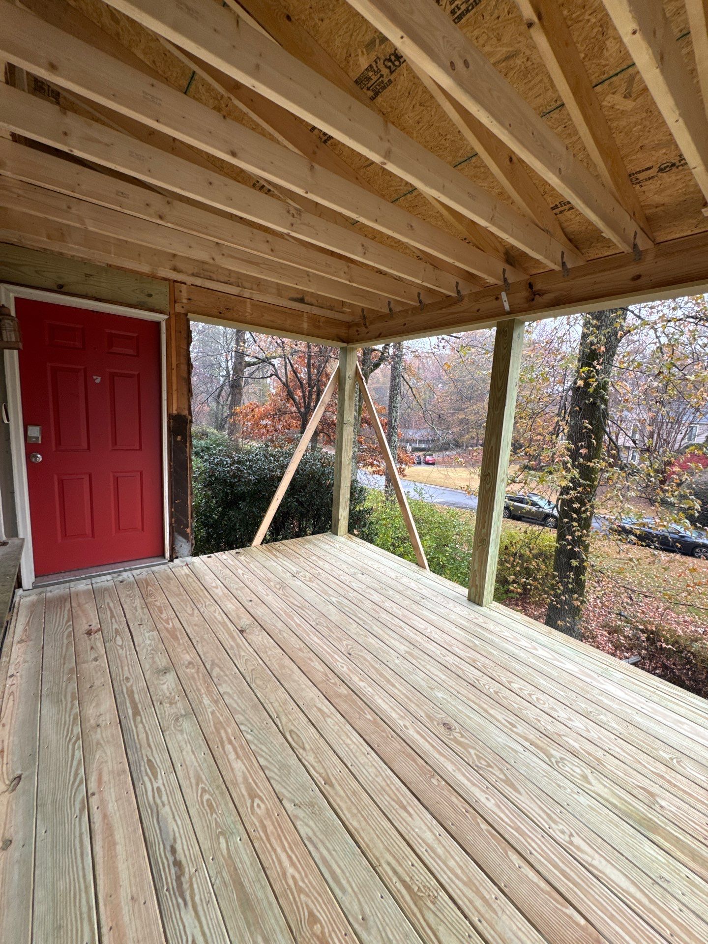 Elevated Wood Deck and Siding Replacement in Marietta by Swift Home Renovations