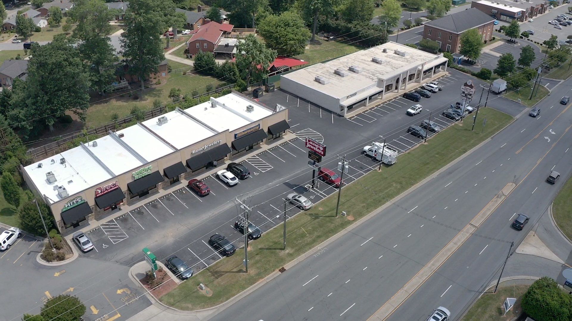 Commercial Roof Coating using Fiberseal basecoat and Silicon Topcoat by Just In Time Roofing and Restoration