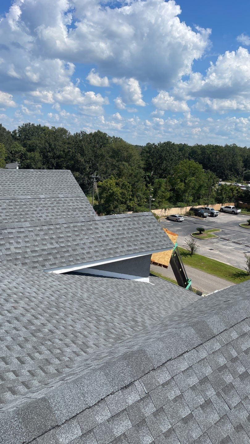 Commercial Roofing Installation using Roof Replacement by American Roofing & Construction LLC