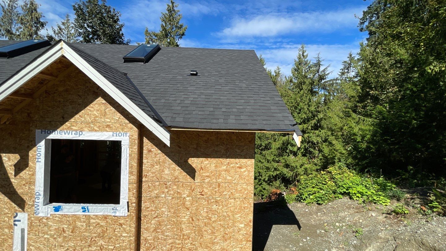 Residential Roofing Installation using OC Oakridge shingles by Top Notch Roofing Inc