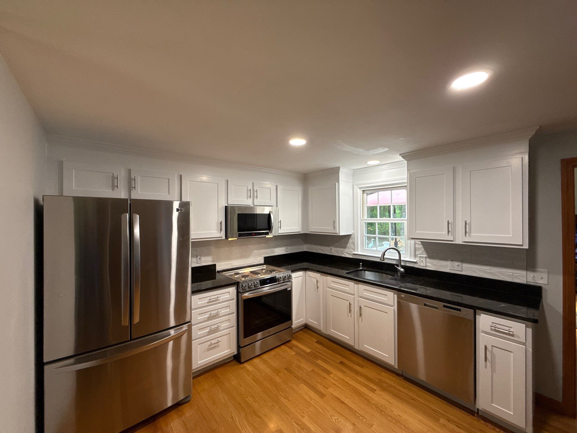 Kitchen cabinets in Dennis, MA by Us Propaint And Renovation