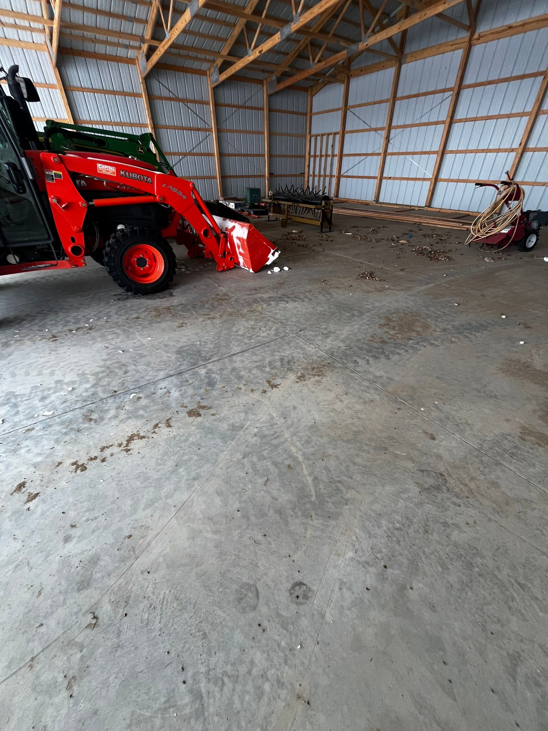 Durable Grey Speckled Epoxy Floor Coating for Yankton Shop by Select Painting, Coatings & Garage Cabinets