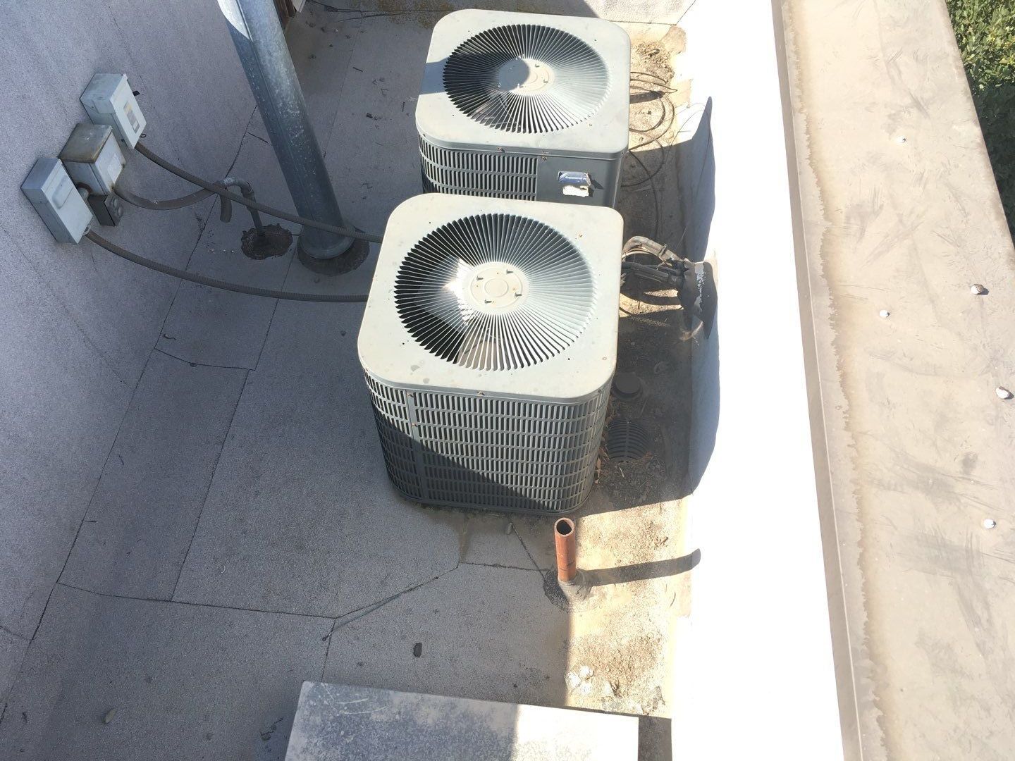 Spray foam and coatings inside commercial building HVAC well using Spray foam and coatings over existing BUR system by Straight Edge Roofing Inc