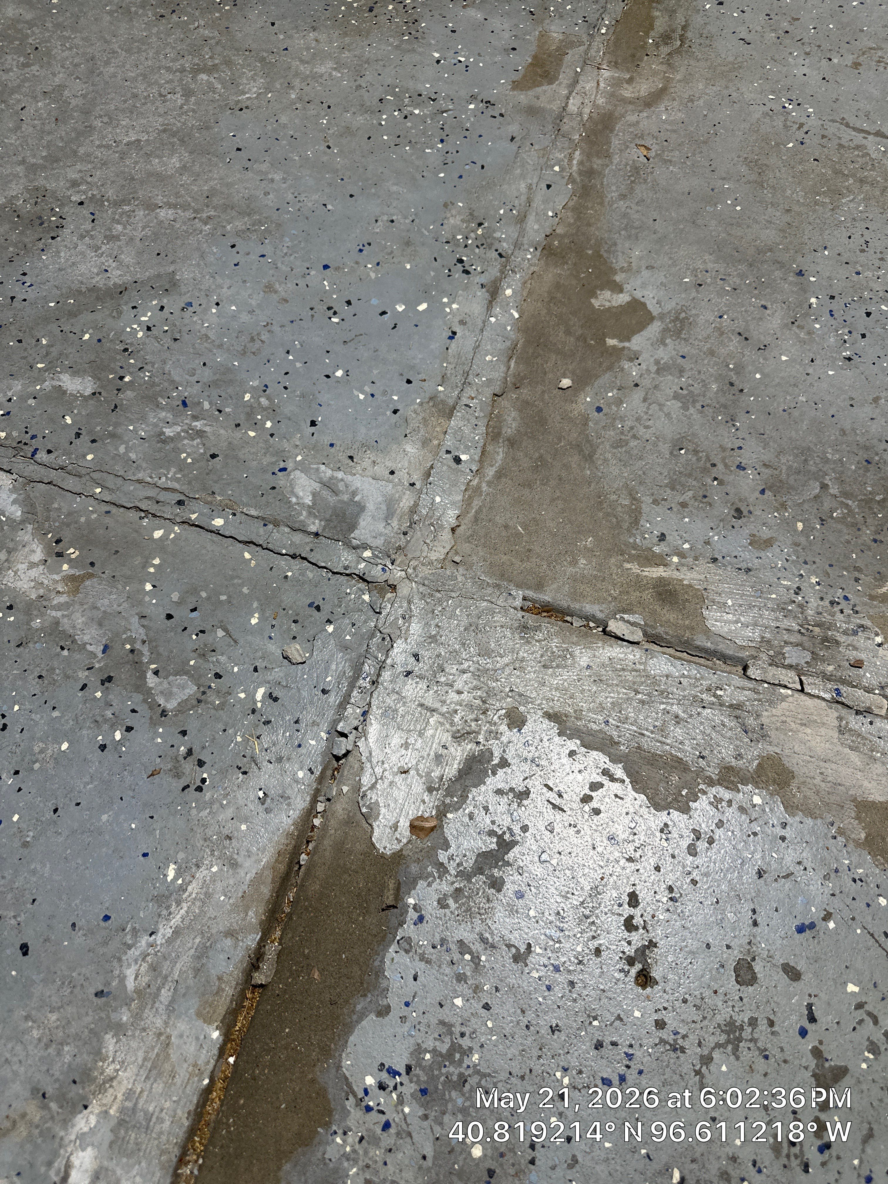 High-Gloss Metallic Epoxy Garage Floor Transformation in Lincoln by Goat Coatings