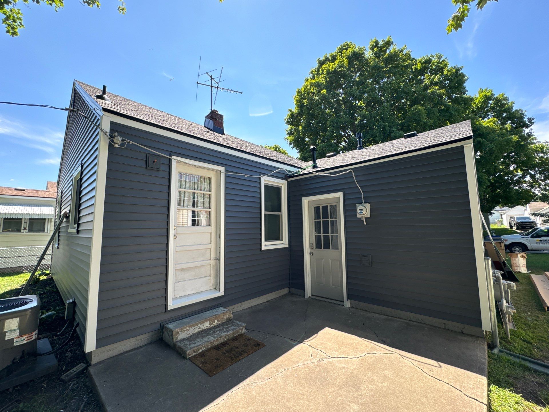 NKC Happy Blues by EEC Windows, Siding & Roofing