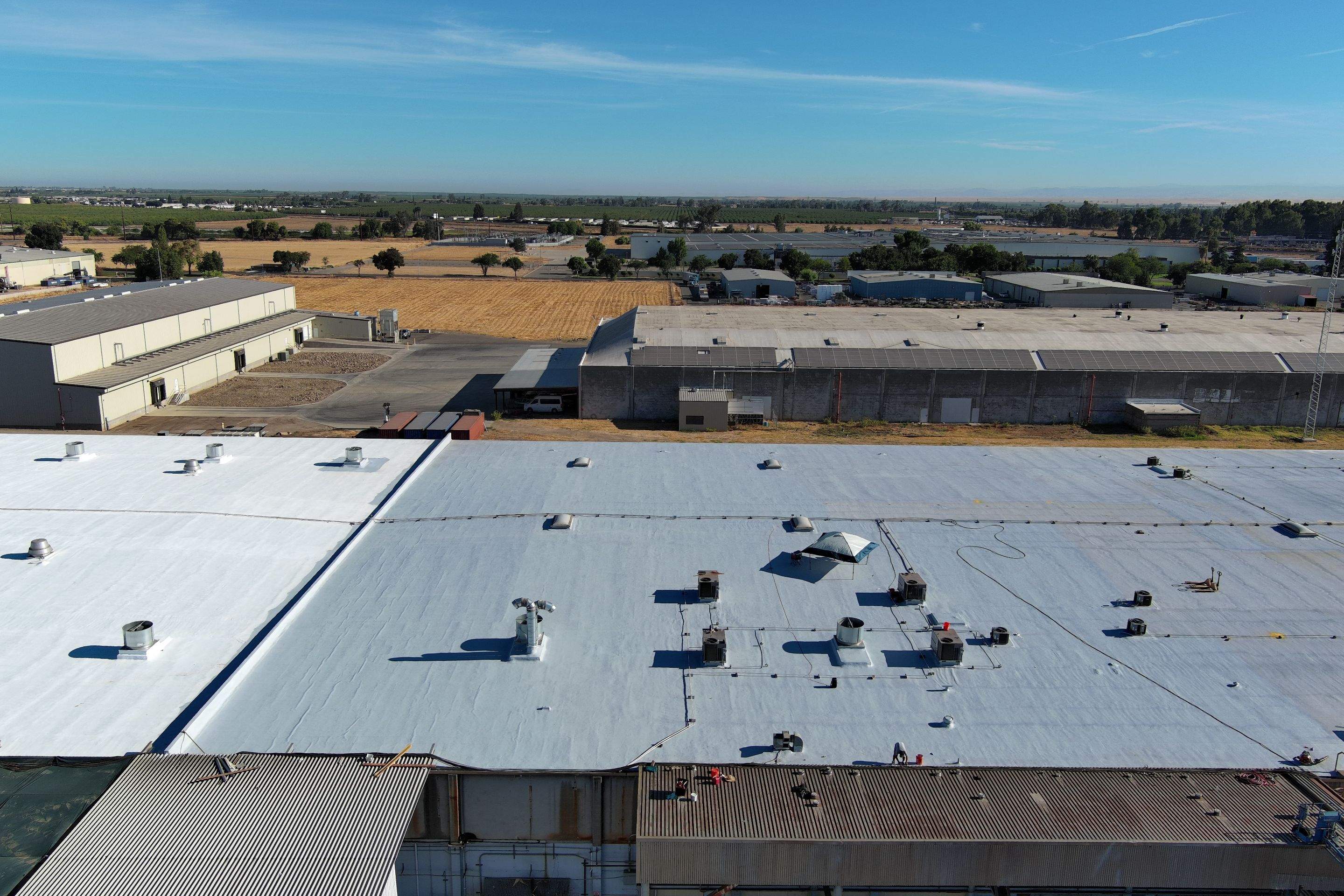 Pro Farms Spray foam roofing project by Straight Edge Roofing Inc