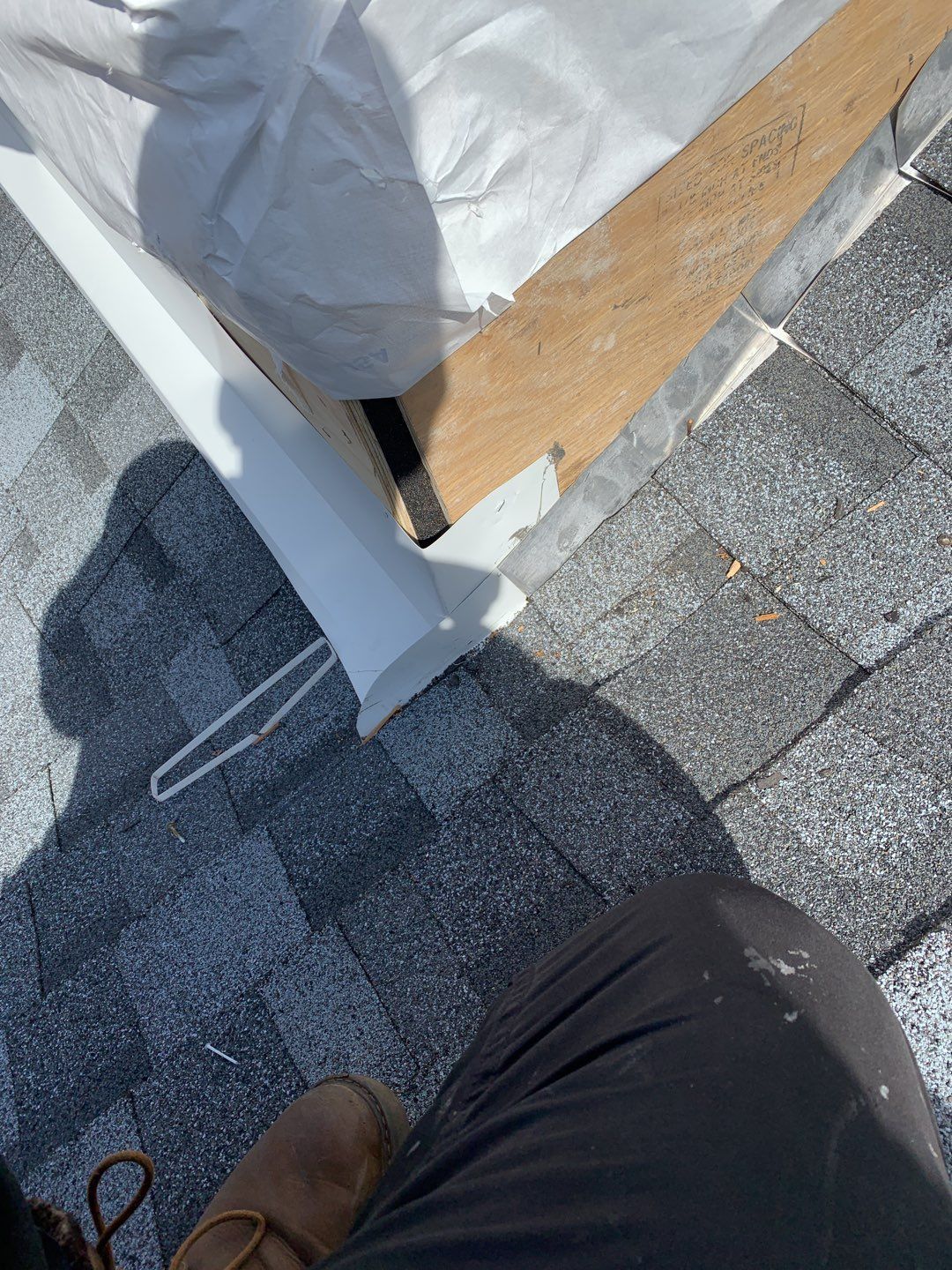 Commercial Roofing Installation using EPDM with white gutters by A Plus Exterior