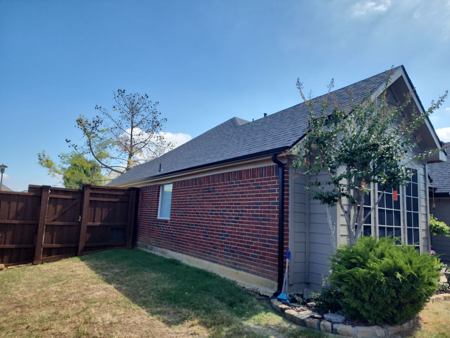 Exterior Makeover Reroof, Gutters and Exterior Paint by Tex-Line Roofing