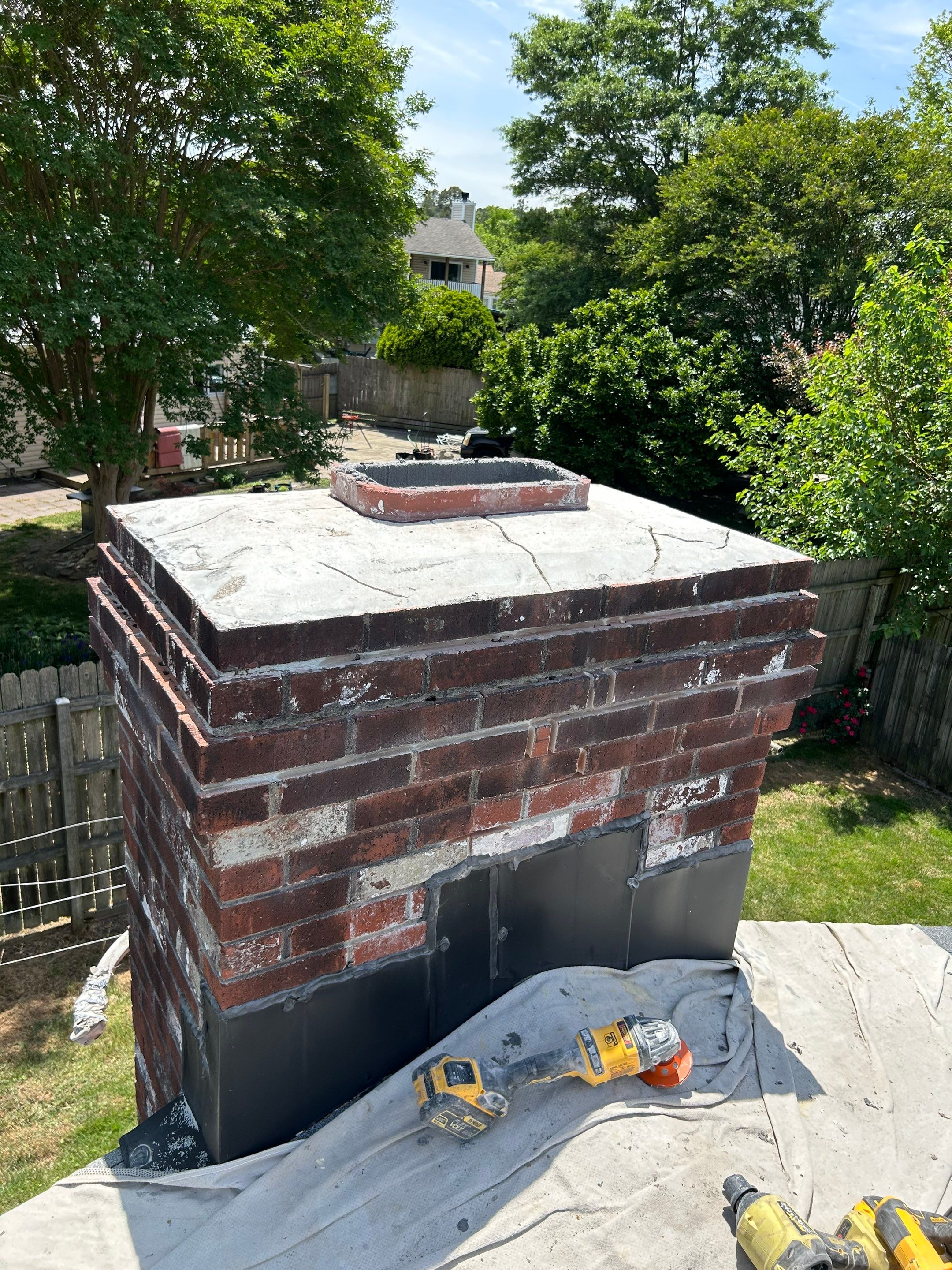 Masonry Chimney Repair - Leak Repair and Flue Lining Repair by Premier Chimney and Roofing