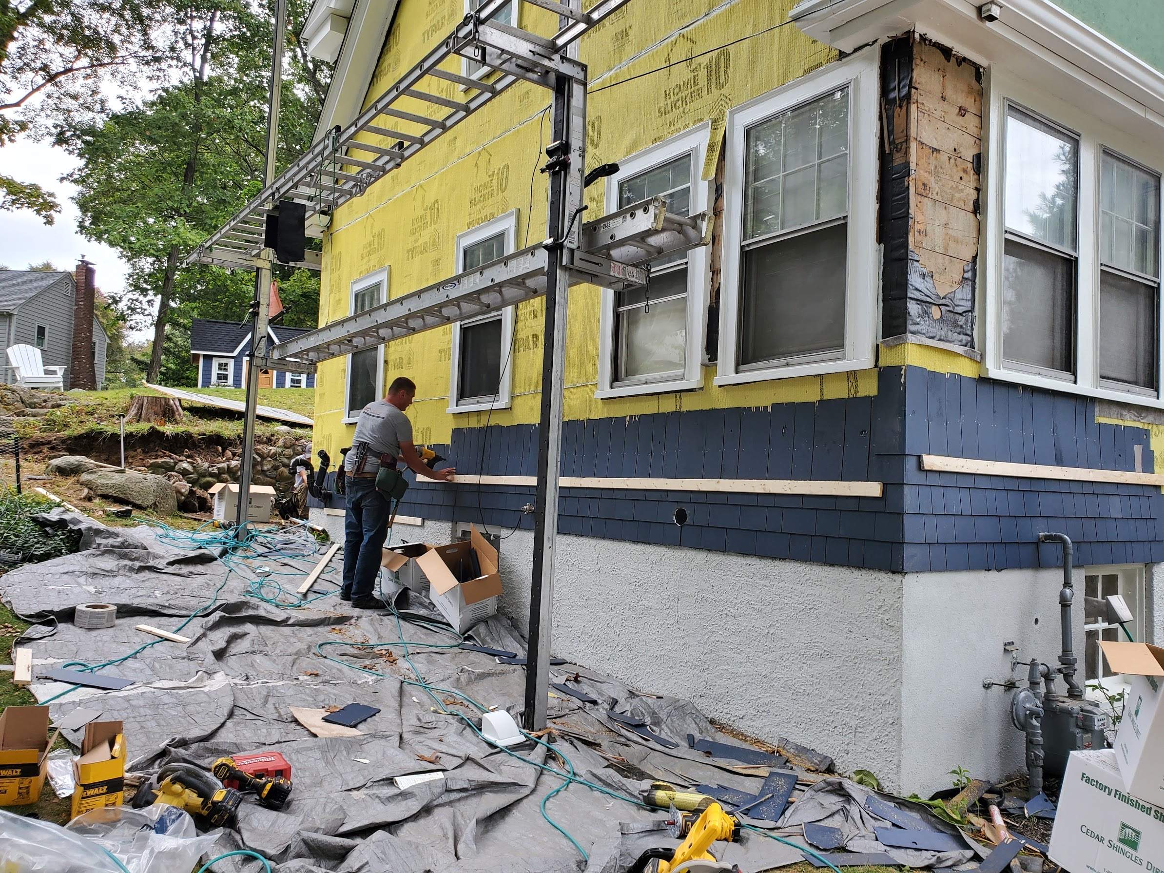 Siding Installation using Red Cedar by UBrothers Construction