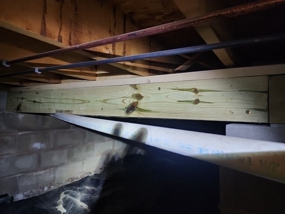 Crawl space encapsulation and Waterproofing using Structural Wood and Steel Reinforcements by Toledo Basement Repair 