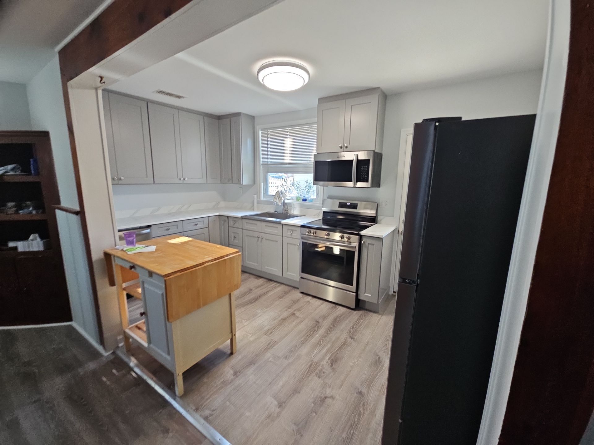 Kitchen and living area remodel by Window Depot of Annapolis