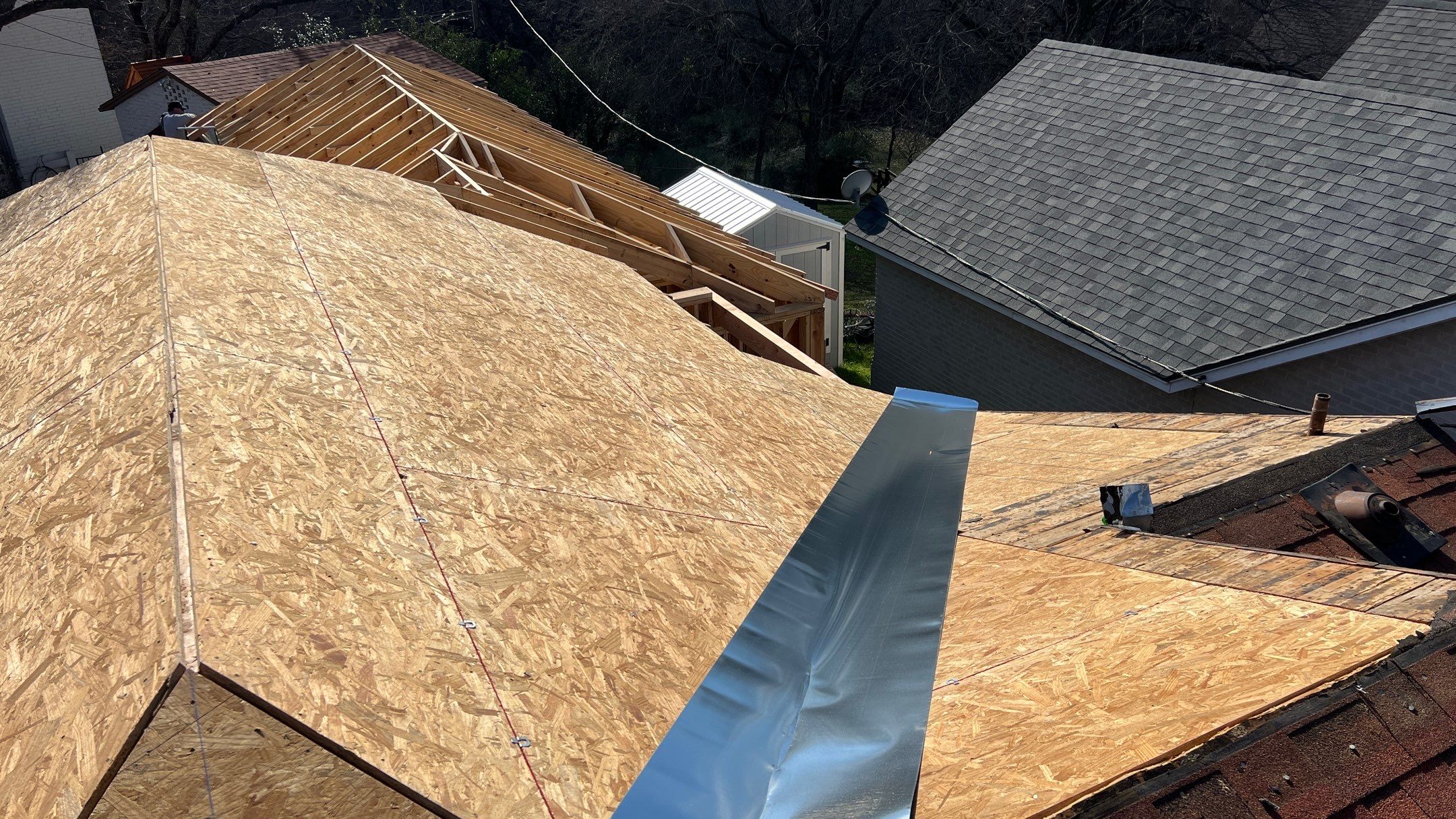 Residential Roofing Installation using Matching Roof Shingles by Harvey Roofing & Construction