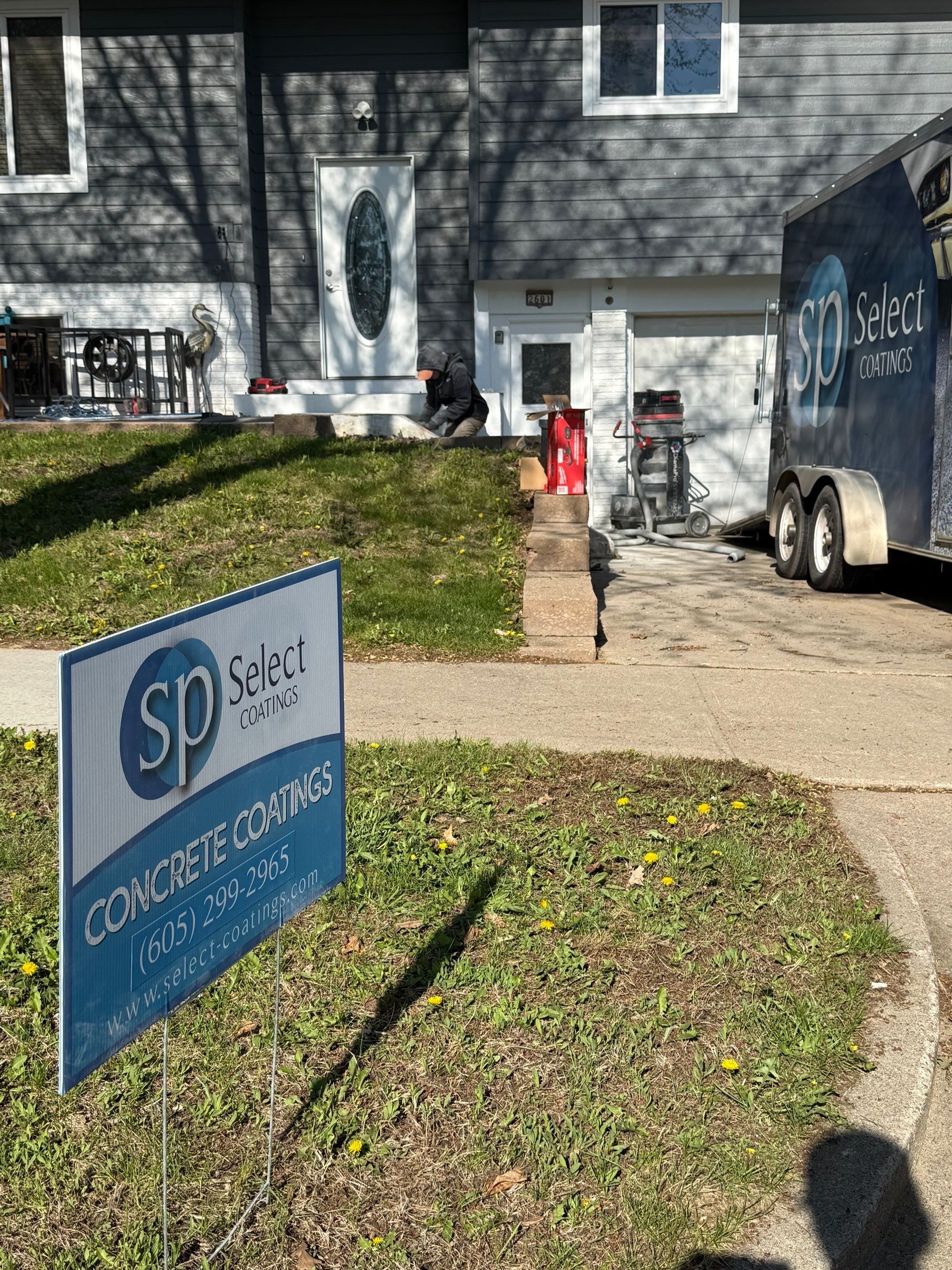 Grey Polyaspartic Porch and Stair Resurfacing in Sioux Falls by Select Painting, Coatings & Garage Cabinets