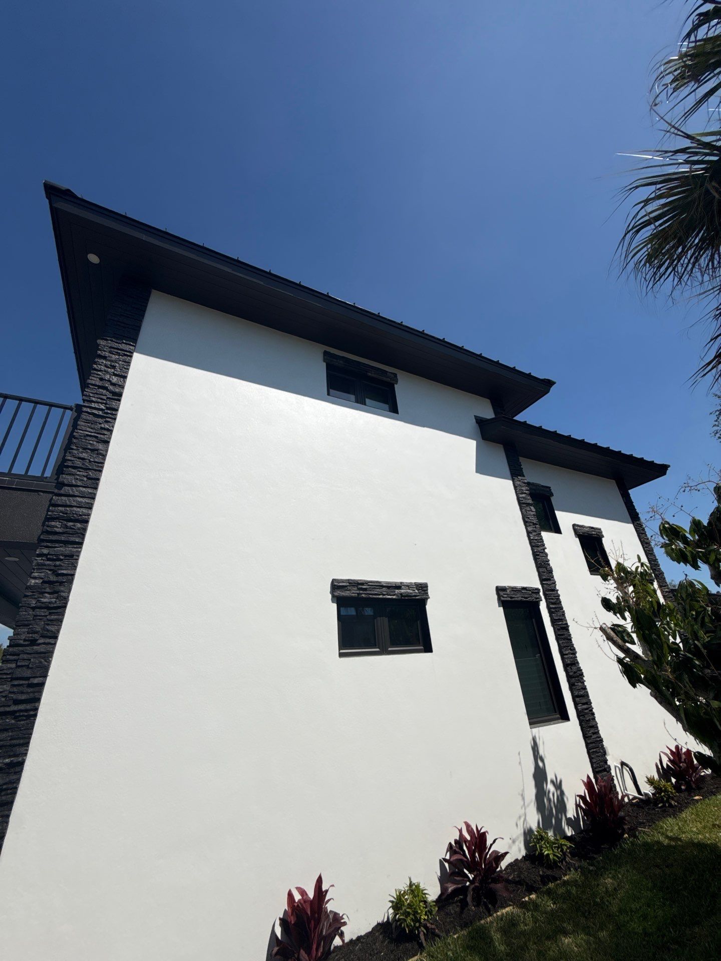 7-Inch Smooth Box Seamless Gutters using black seamless gutters in Siesta Key Fl by Gutter Professors
