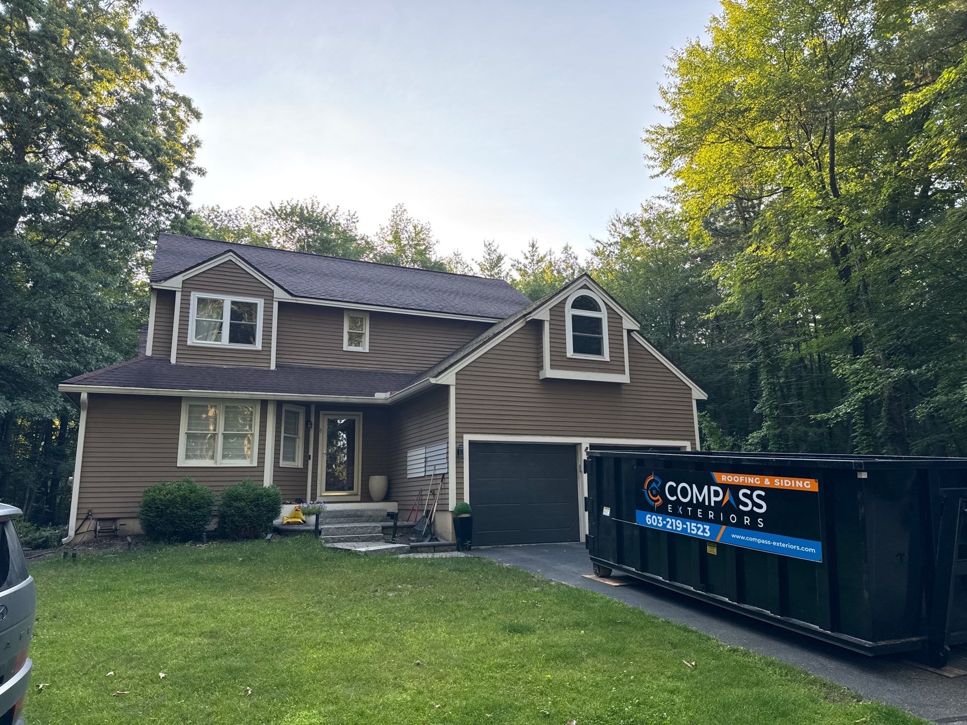 Complete Exterior Remodel in Stratham, NH Near Turnberry Road with Roofing, Siding, Windows, Gutters, and PVC Trim by Compass exteriors