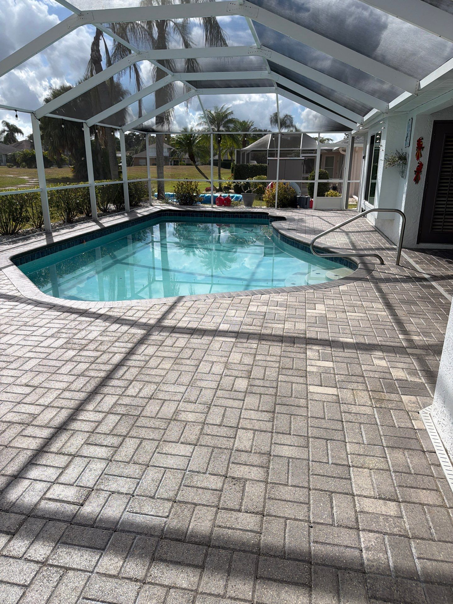 Paver Sealing for Screened Pool Deck in Sun City Center by Supreme Paver Experts