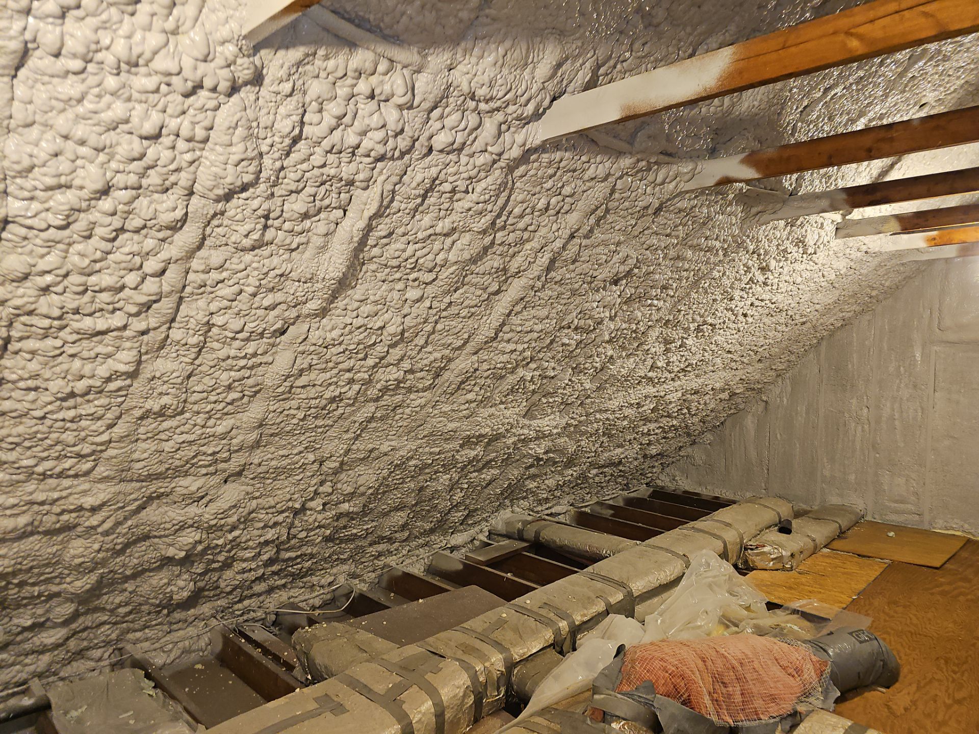 Attic Retrofit using open cell spray foam by NYS Foam & Energy