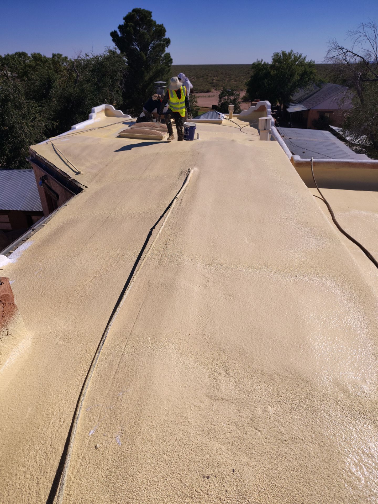 Residential roof application by SPF Services 