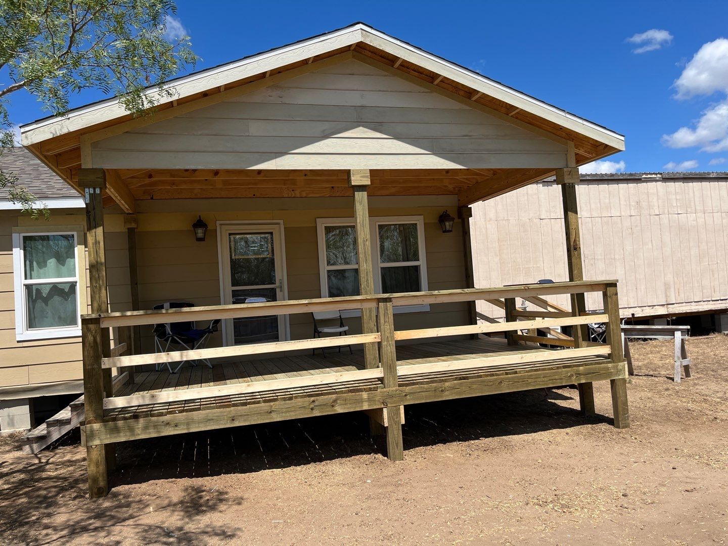 Front Porch Sitt'n by Bayfront Roofing and Construction