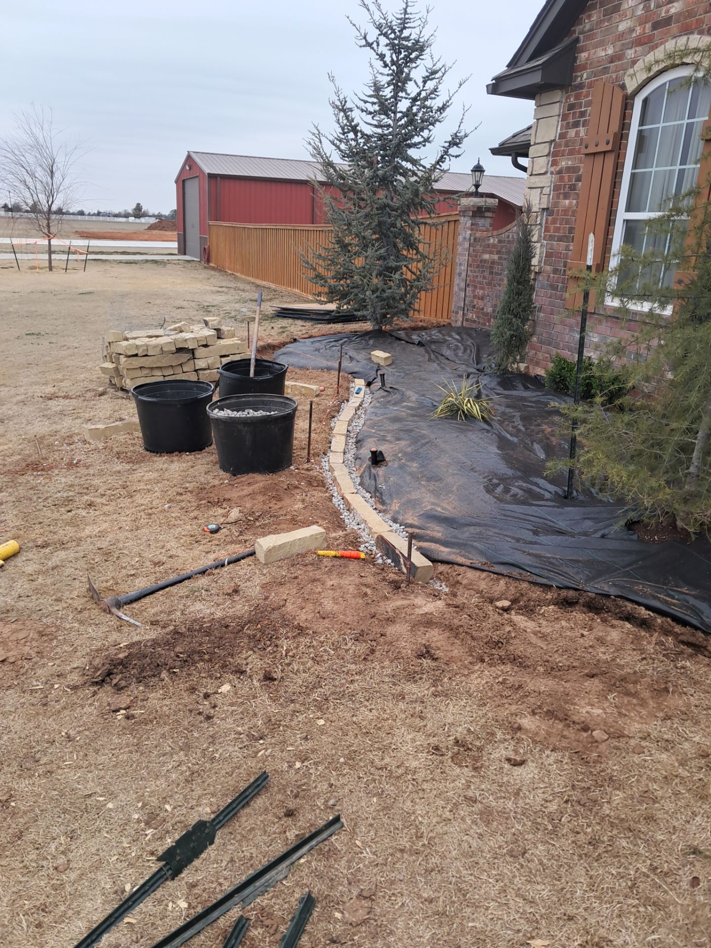 Landscape installation w/ irrigation and landscape lighting by Clays Services Inc