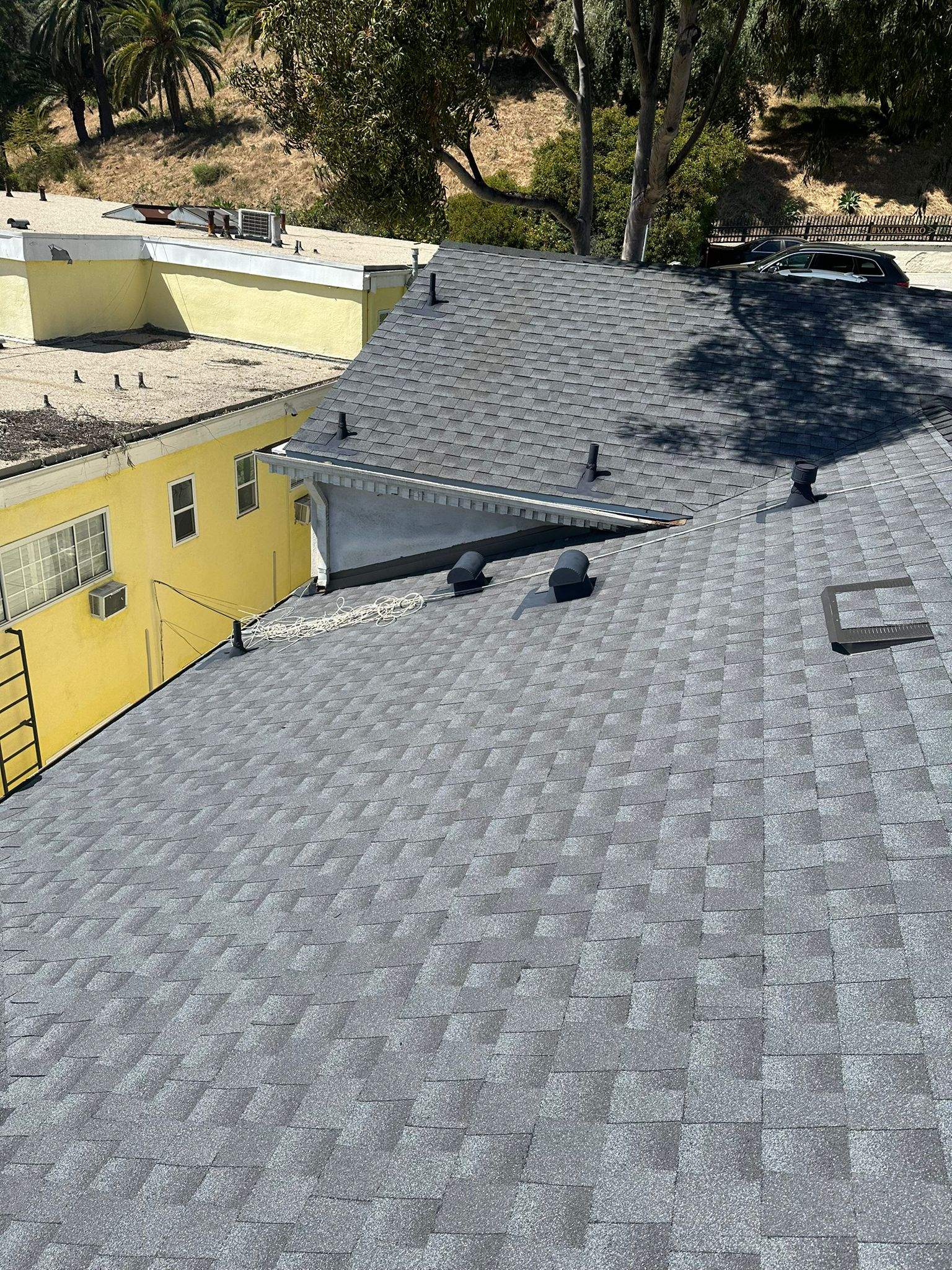 Roof Replacement at the Magic Castle Hotel- Los Angeles, CA 90028 by Epic Roof Replacement