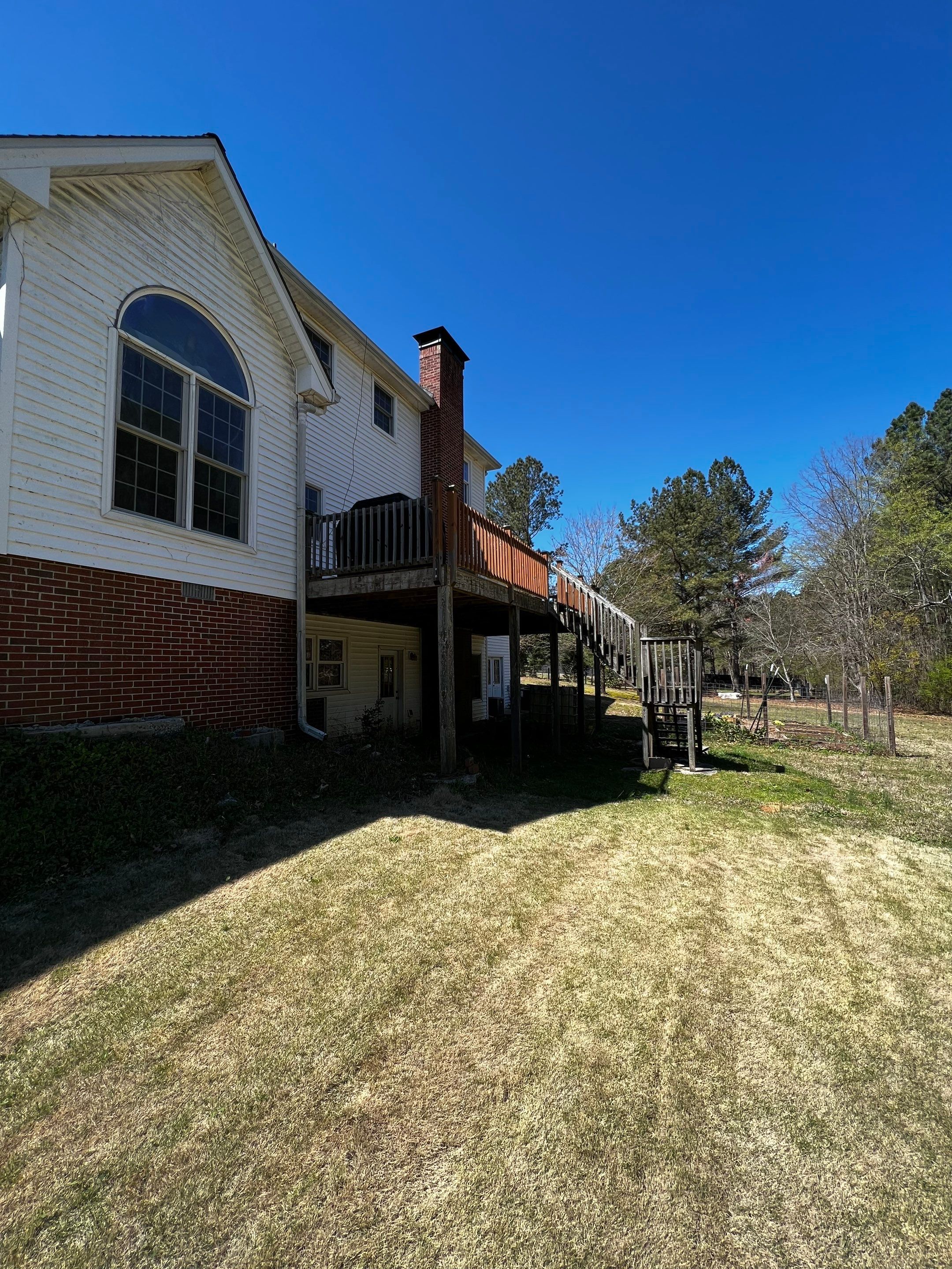 Pressure-Treated Wood Deck and Side Porch Replacement in Dacula by Swift Home Renovations