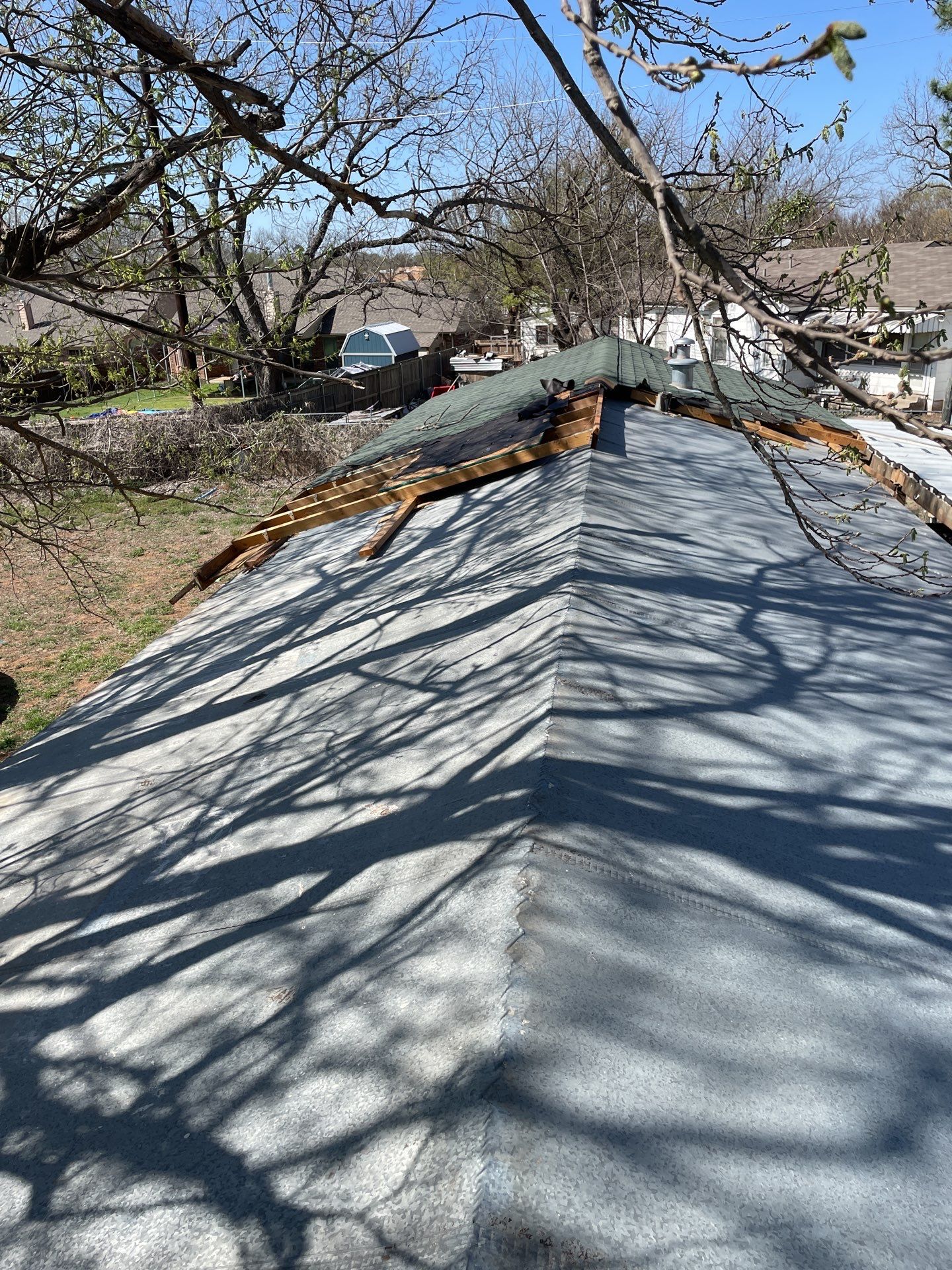 Roof Damage using ATLAS Pinnacle Pristine Shingles by Harvey Roofing & Construction