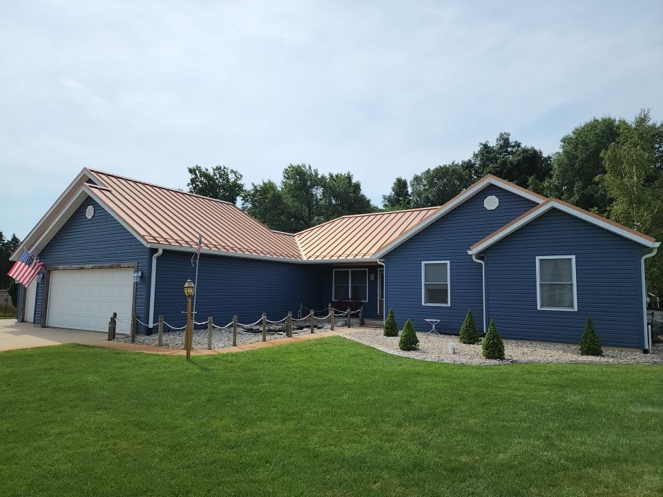 Residential Roofing and Siding Installation using Copper Penny Standing Seam by 4Ever Metal Roofing
