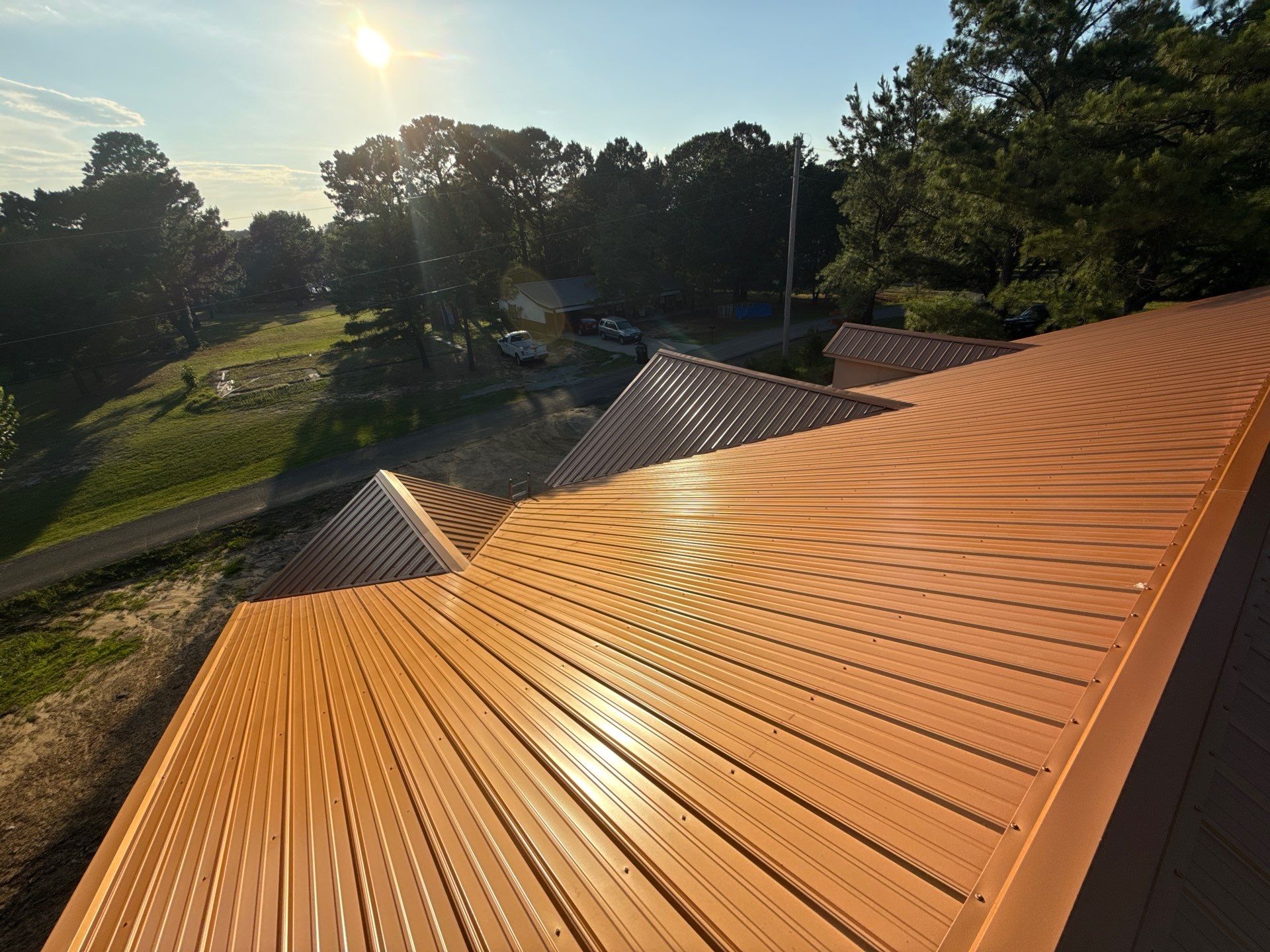 Copper Metallic 26-gauge low rib metal roofing. by In & Out Construction & Remodeling, LLC