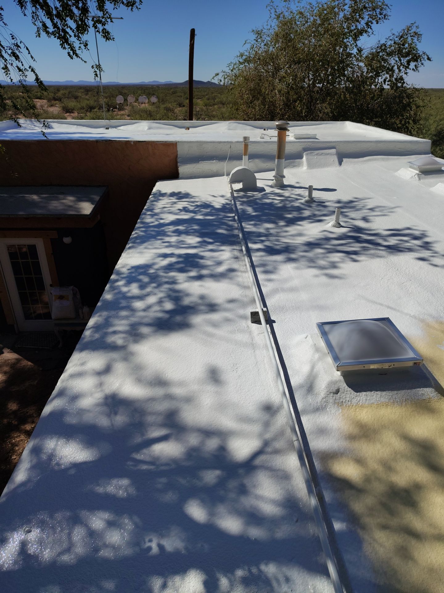 Residential roof application by SPF Services 