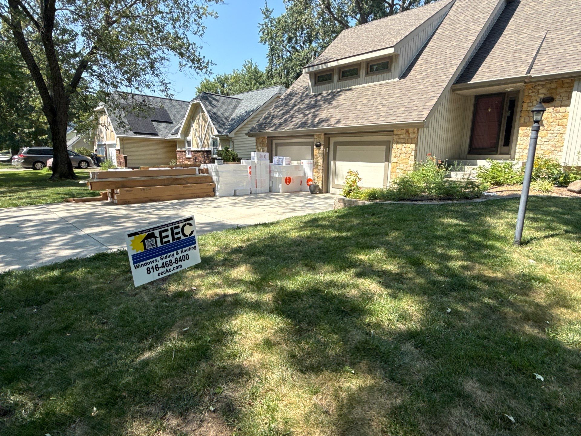 Comprehensive Kansas City Exterior Remodel Featuring Board And Batten Siding by EEC Windows, Siding & Roofing