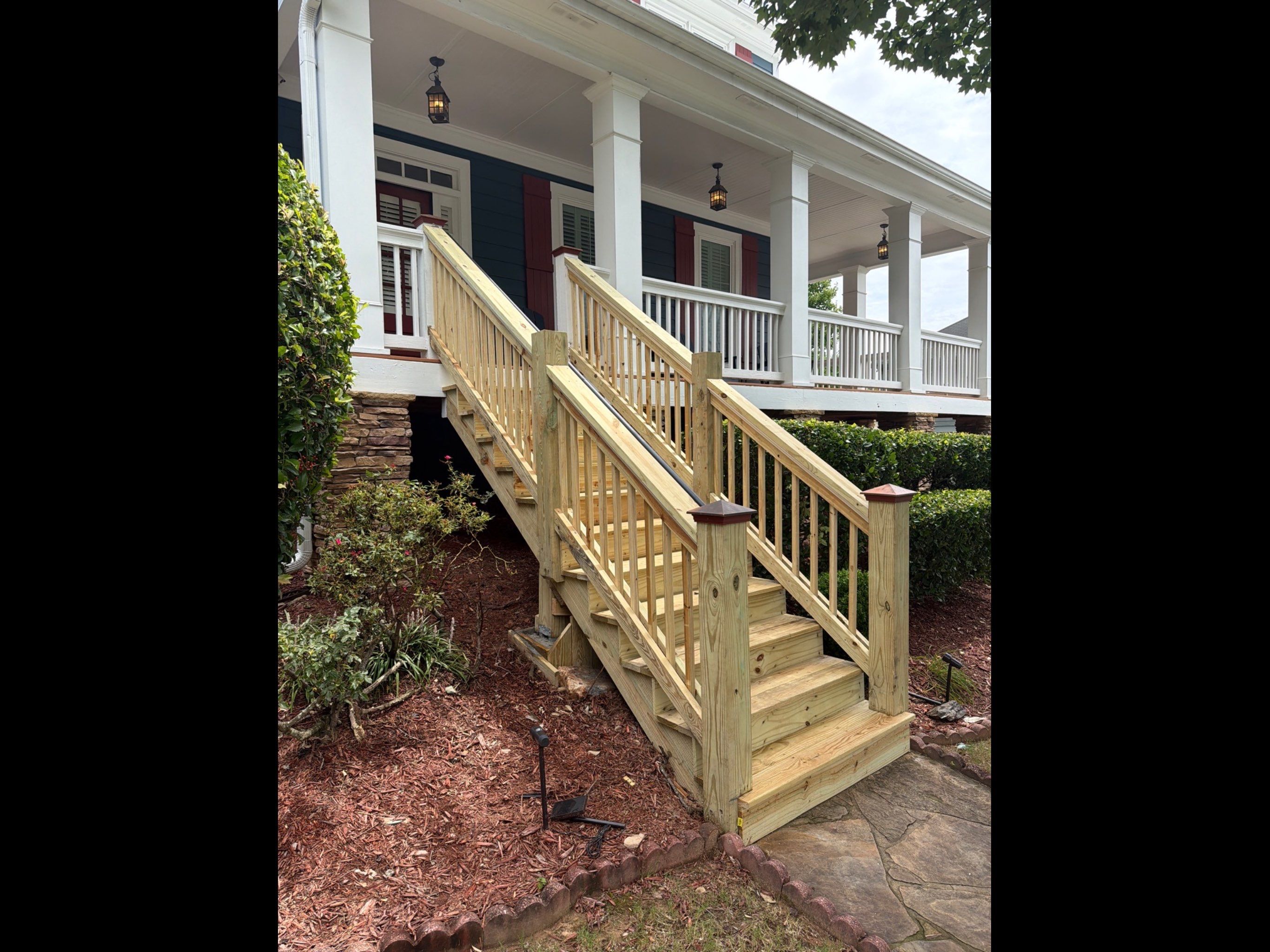Pressure-Treated Wood Front Porch Stair Reconstruction in Atlanta by Swift Home Renovations
