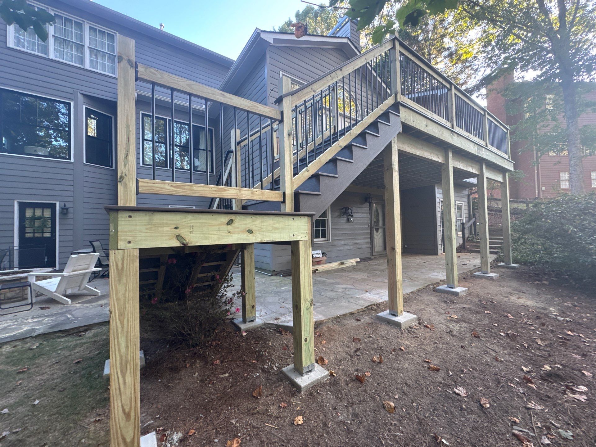Custom Multi-Level Composite Deck and Sunroom Addition in Suwanee by Swift Home Renovations 