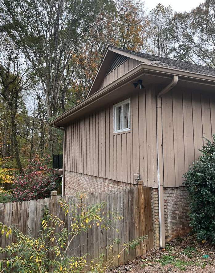 Siding, Gutter, and Replacement with Exterior Painting on 1974 Built Home in Roswell, GA by Nelson Exteriors 