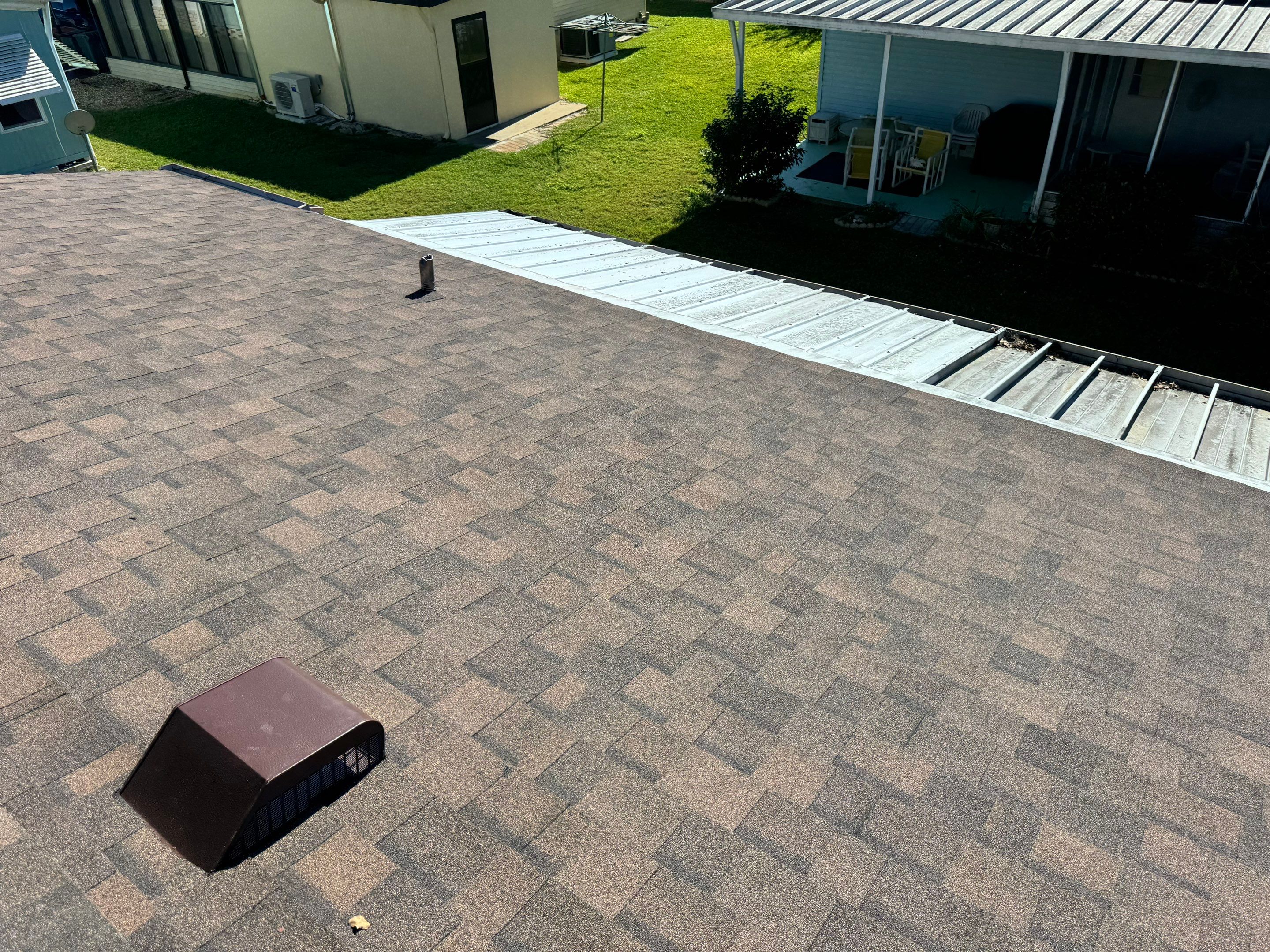 Brownwood Shingles by Reimagine Roofing