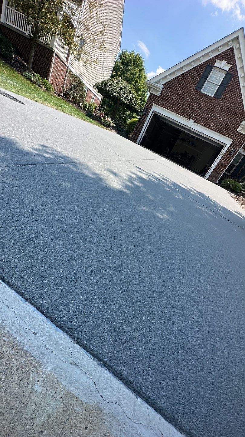 Pool Deck + Driveway + Garage Project in Venetia by Floors in a Day, Inc