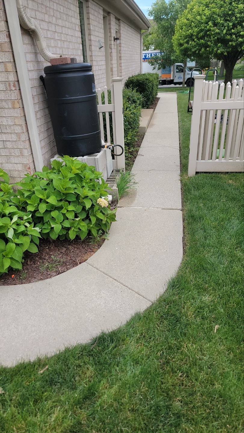 concrete power washing Algaecide, soft wash soap by Northern Power Washing LLC.