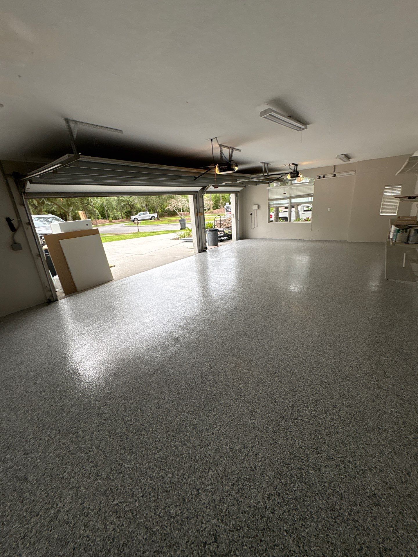 Tampa 2-Car Garage Transformation by Performance Floors & Coating