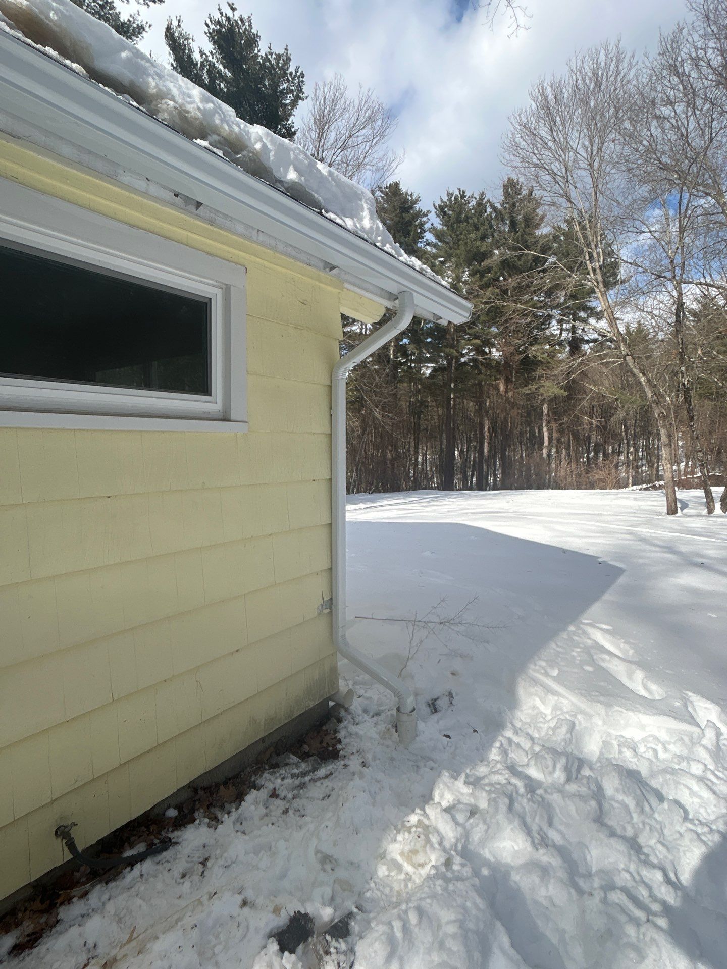 Gutter Installation Project in Stow by Mighty Dog Roofing of Greater Middlesex County