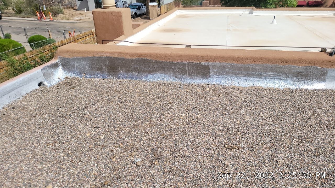 Roof Maintenance and Low-E Tempered Glass Skylight Replacement on Gravel Roof in Northwest Albuquerque by Doyle Roof Masters Inc
