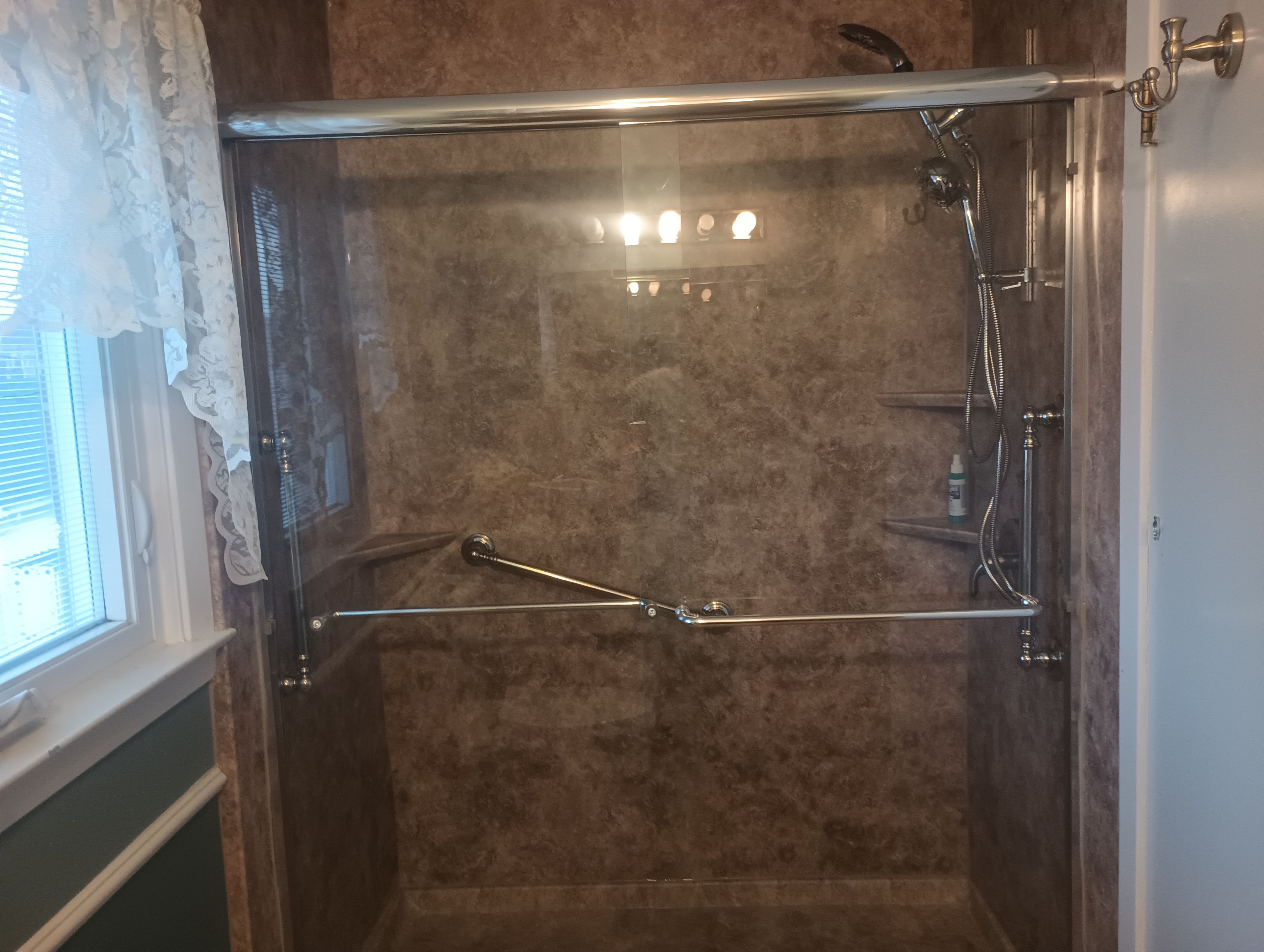 Tub to Shower Conversion using BCI Acrylic Shower System by Secure Construction Company Inc
