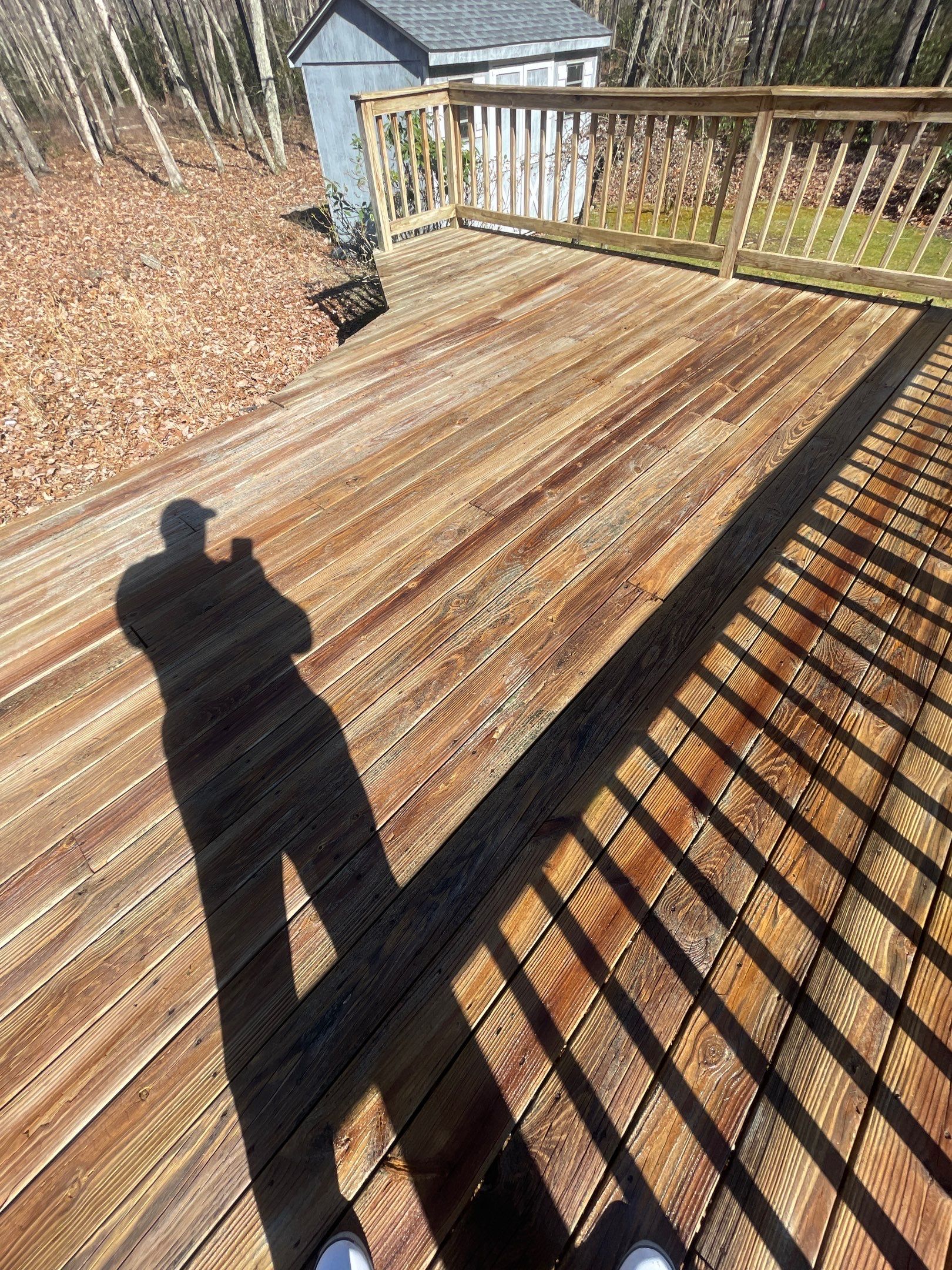 Pressure treated wood deck cleaned by SJ Exterior