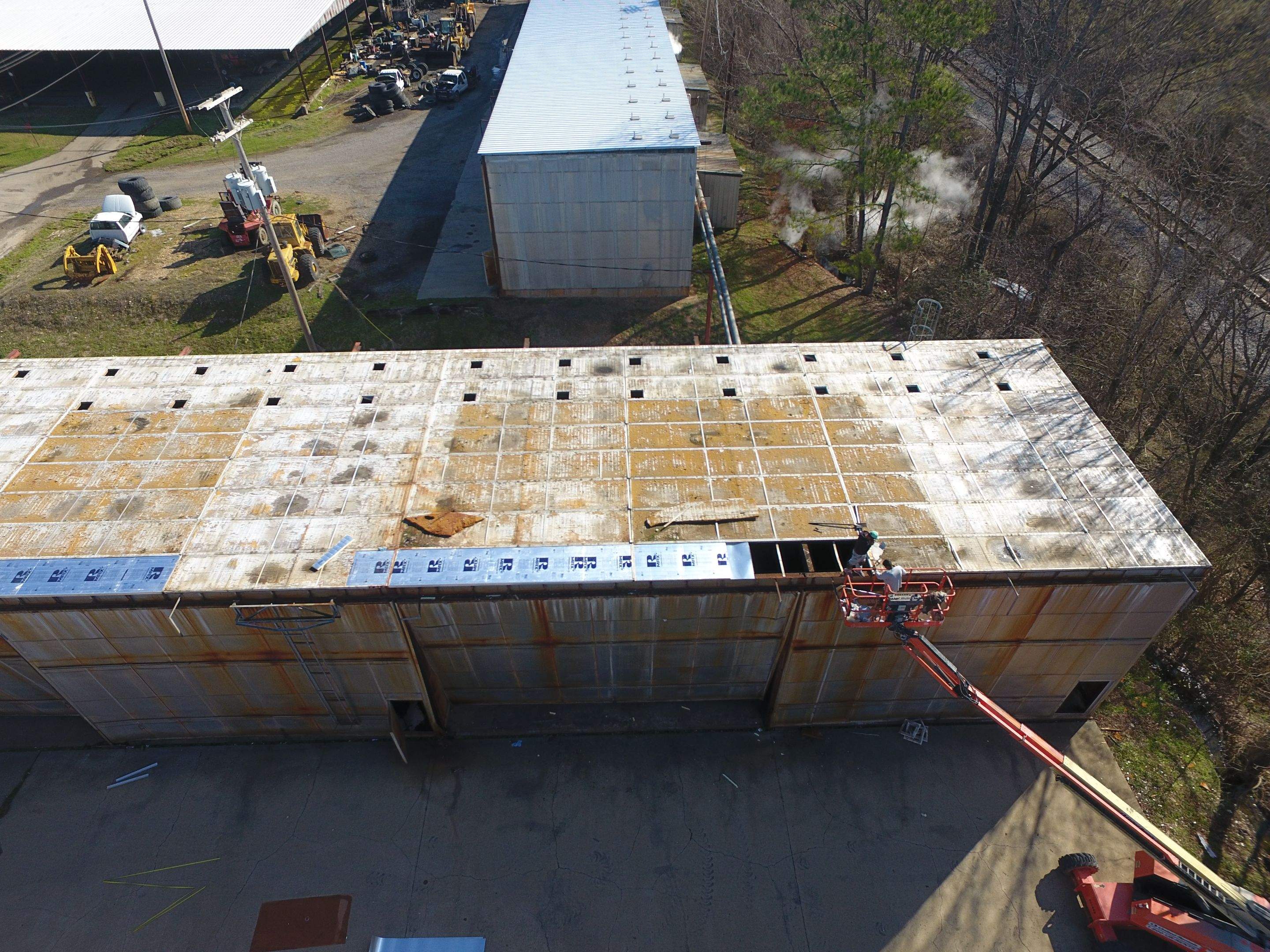 Commercial Roofing Installation using Aluminum Roofing panels by Hostetler Roofing
