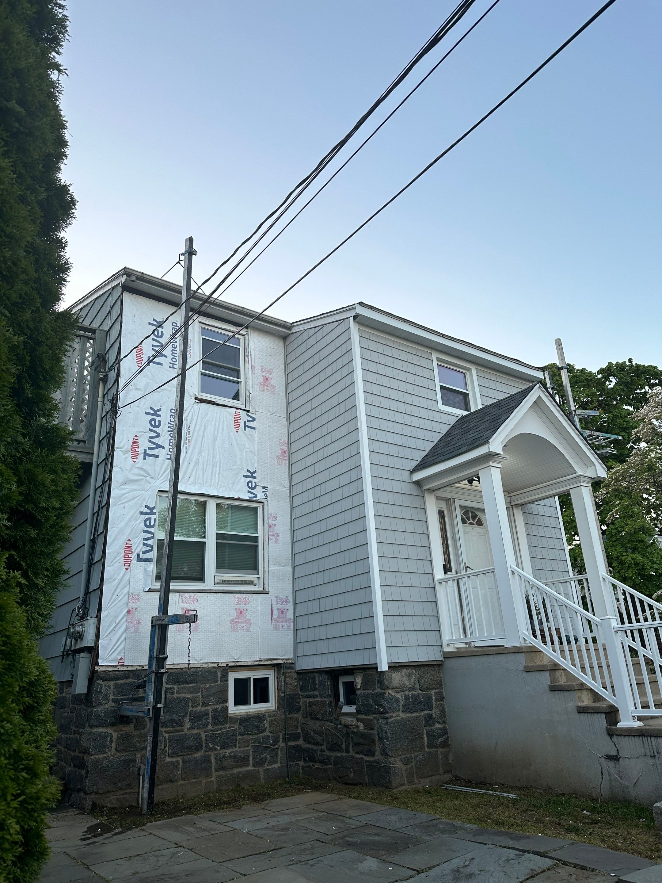 Siding Installation using Certainteed Cedar Impressions Straight Edge Perfection Shingles - D7 - Sterling Gray by A Plus Exterior