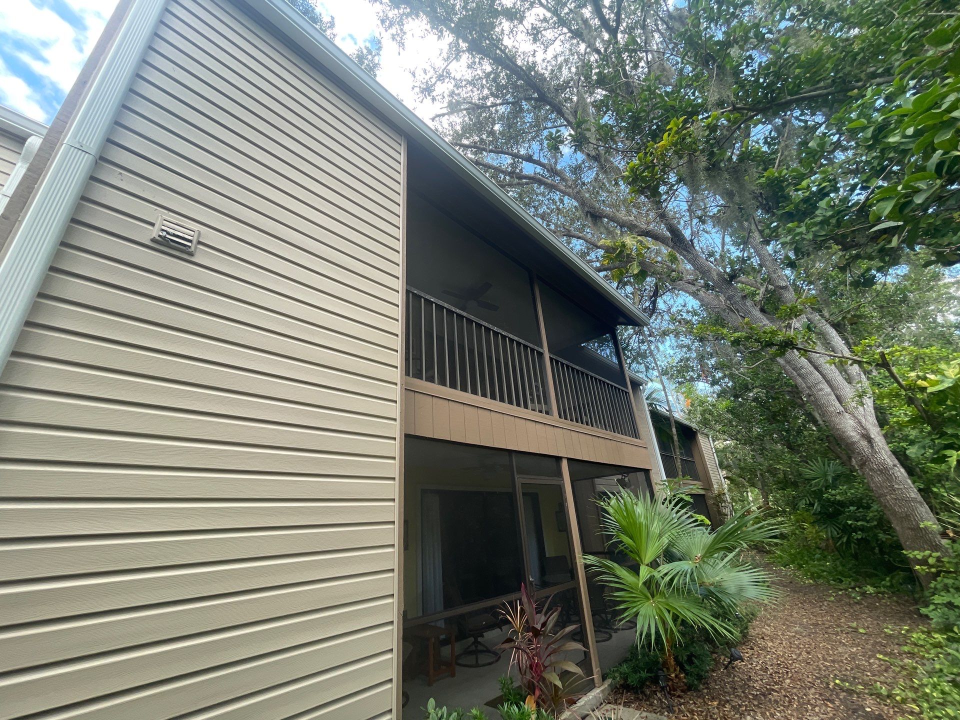 Clean Gutters and Roof in Sarasota FL by Gutter Professors