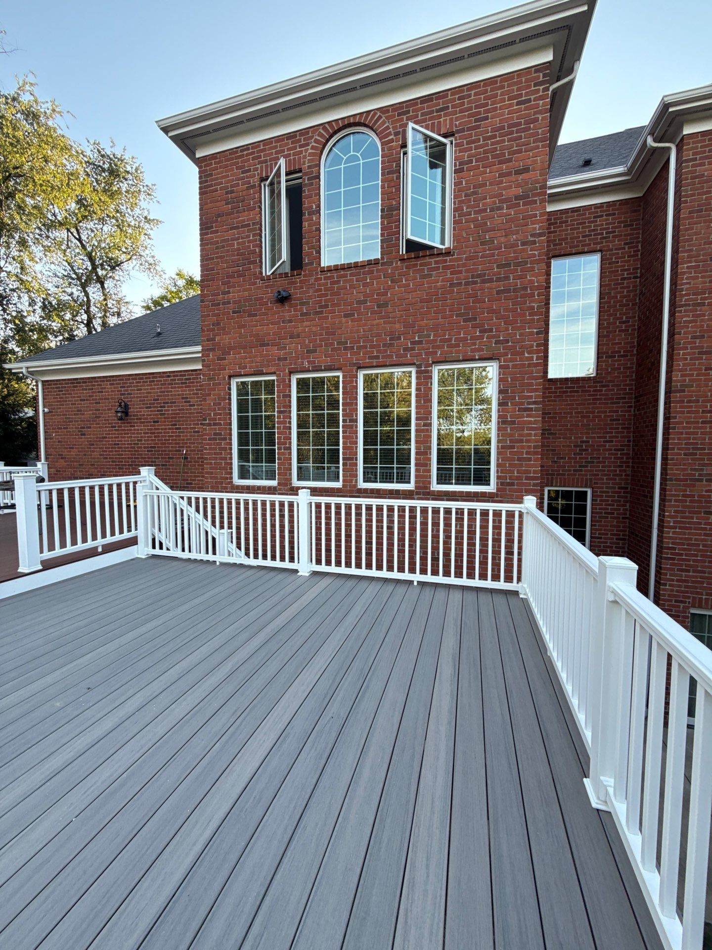 Deck extension  by Cousins Roofing Siding & Decks
